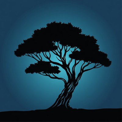 Silhouette of a tree against blue background