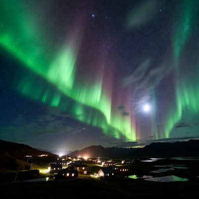 Northern lights shine over village