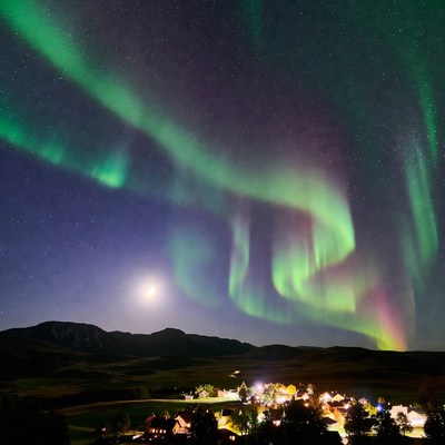 Northern lights over a quiet village