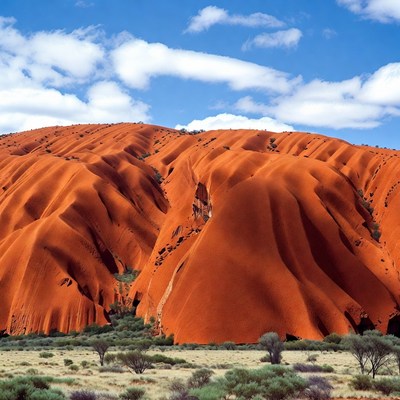 Red hills under blue sky