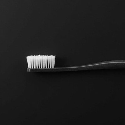Simple black and white toothbrush design