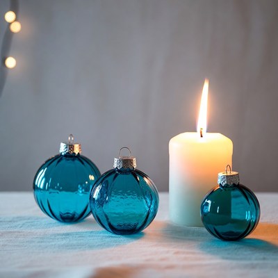 Decorative ornaments and a candle