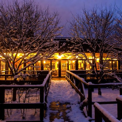 Snowy night at warm lodge