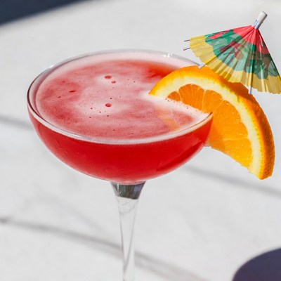 Refreshing cocktail with orange slice