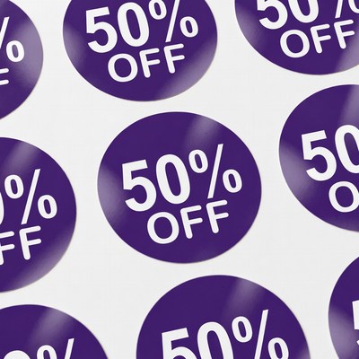 Sale stickers with discount offers on display