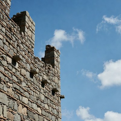 Stone wall under blue sky