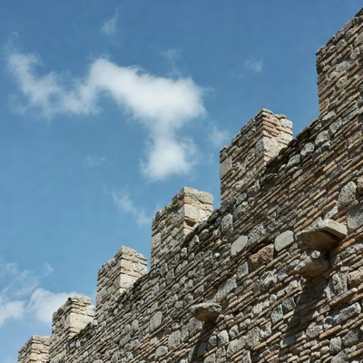Stone wall under blue sky