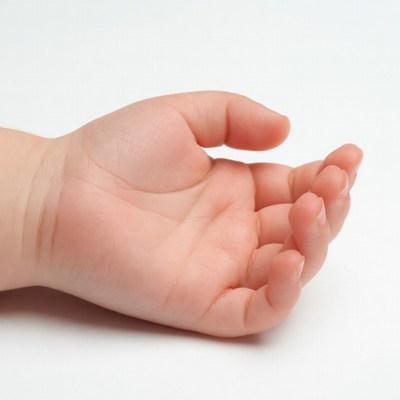Baby hand reaching out for touch