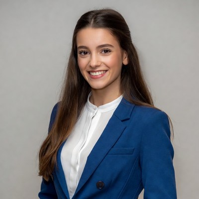 Woman in blue suit smiling