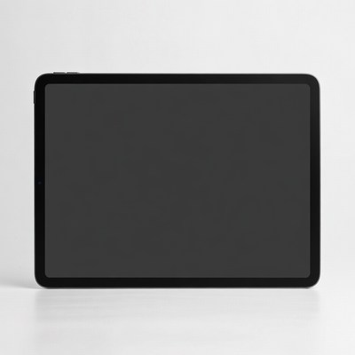 Black tablet on a white table