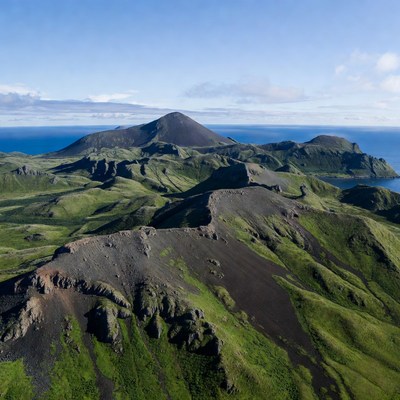 Mountains by the ocean in summer
