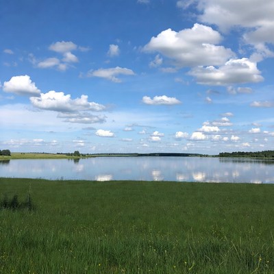 Clear lake under blue sky
