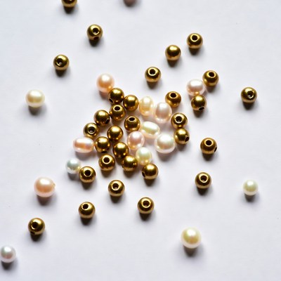 Group of beads on white surface