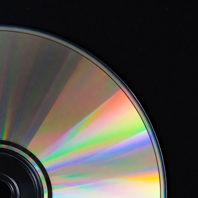 Colorful compact disc on a dark background