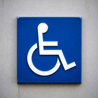 Sign for accessible restroom location