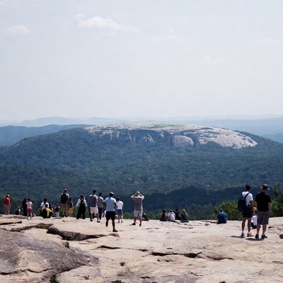 Hikers enjoy scenic view at summit