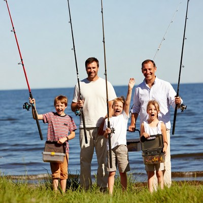 Family fishing by the water