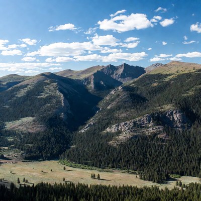 Mountains and forests under clear sky