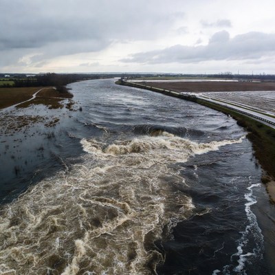 Fast flowing river near highway