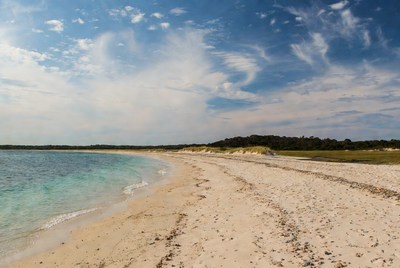 Beautiful beach with clear water and sand