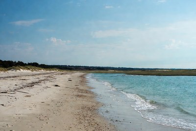Beach scene with water and sand