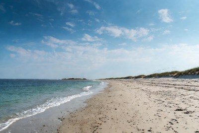 Beach view at midday near water