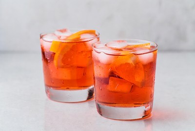 Bright drinks with ice and orange slices