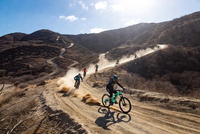 Mountain biking on dusty trails in daylight