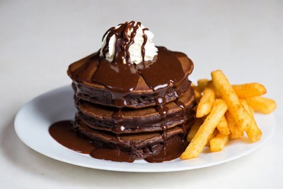 Chocolate pancakes with fries served together