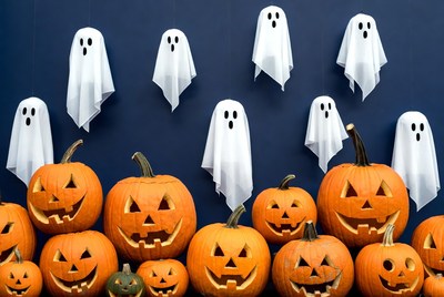Halloween decorations with pumpkins and ghosts