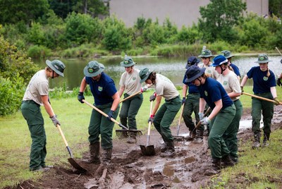 Volunteers work on trail restoration