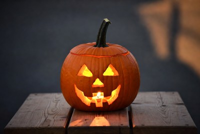 Carved pumpkin with candle light