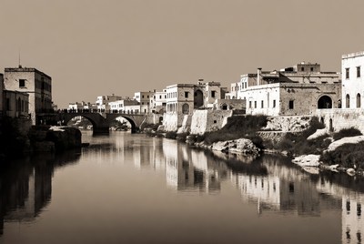 River view of historic town buildings