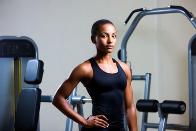 Strong woman in gym training