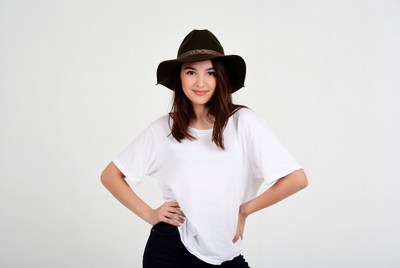 Model poses in studio setting