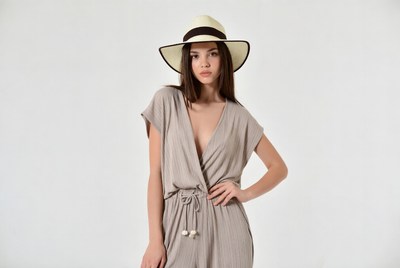 Model wearing summer outfit and hat
