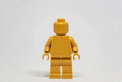 Yellow lego figure standing still