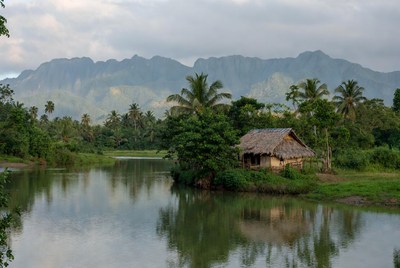 House by the river in the mountains