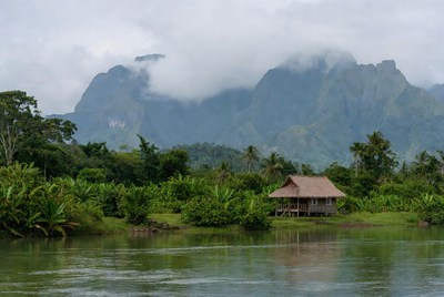 House by the river in the mountains