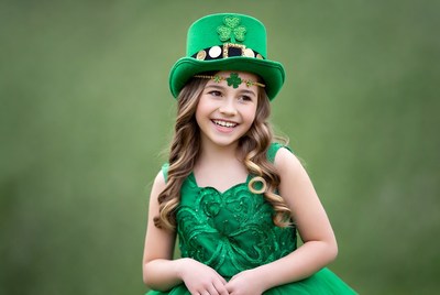 Girl in green dress celebrating st. patrick's day
