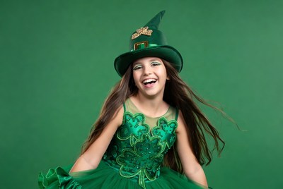 Girl in green hat and dress