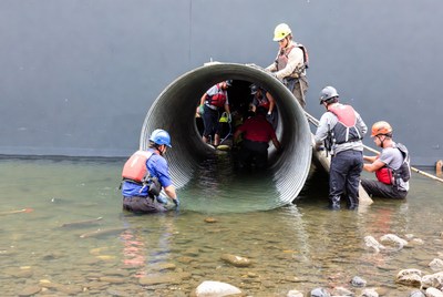 Rescue team works at water pipe