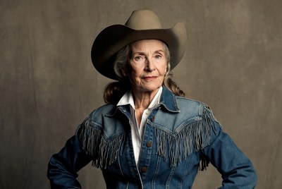 Elderly woman wearing cowboy hat