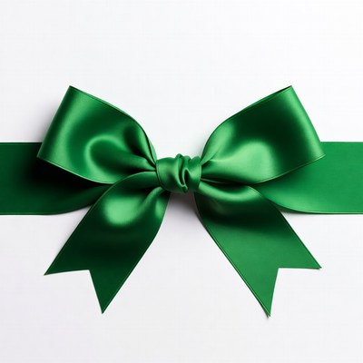 Green ribbon with bow on white background