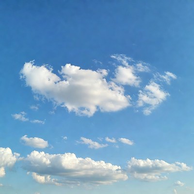 Clouds in a clear blue sky