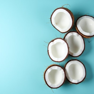 Coconuts on a blue surface