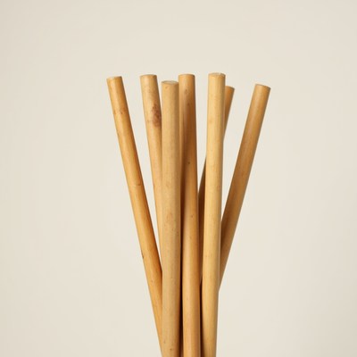 Bunch of cylindrical bamboo sticks