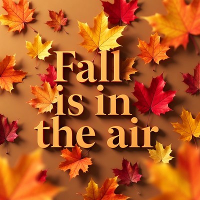 Fall leaves and seasonal greeting on backdrop