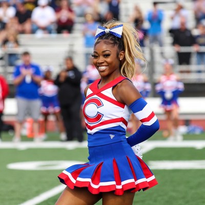 Cheerleader performing at school event
