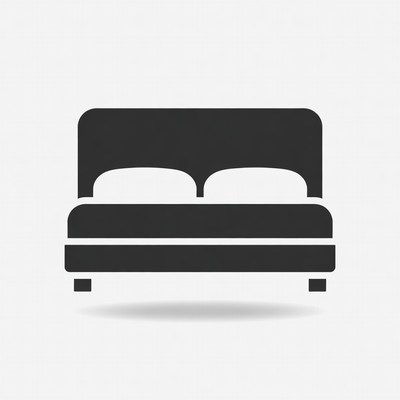 Simple black bed design with two pillows